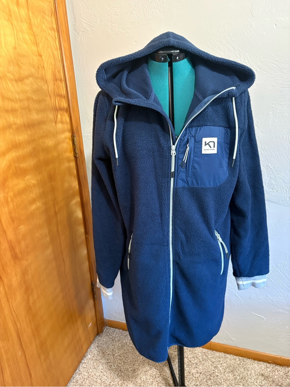 Kari Traa Navy Hooded women’s fleece long jacket